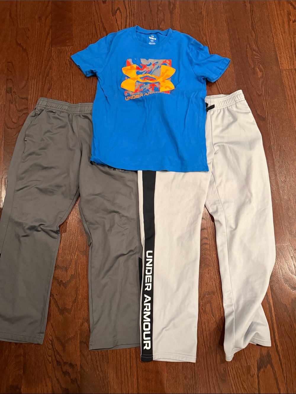 Set f Under Armour pants and shirt- size youth medium